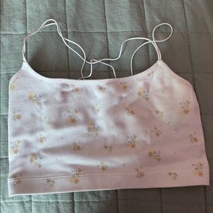 White crop top with cross over straps and yellow flowers